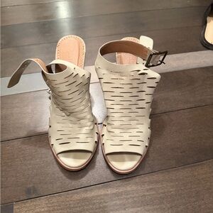 Restricted Cream Cutout Heels